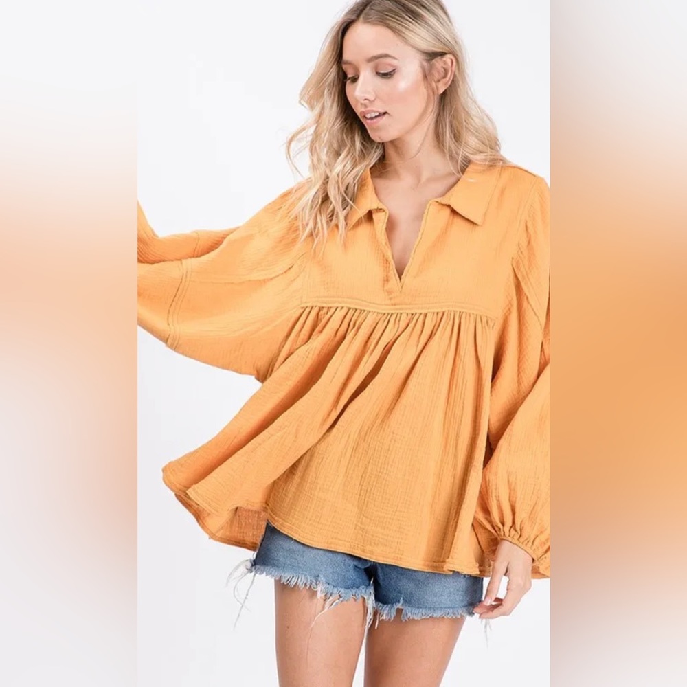 Comfy and casual top that looks great with skinnies or denim shorts.